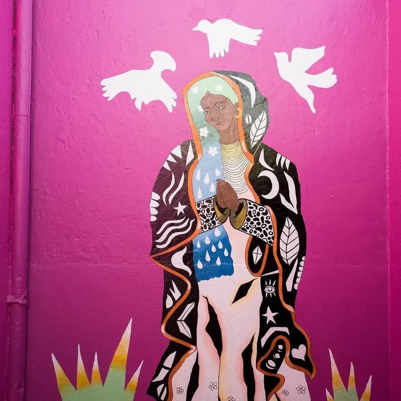 Pink mural with doves